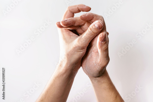 Hand washing as a symbol of the prevention of Wuhan coronavirus Covid-19. White background isolated photo