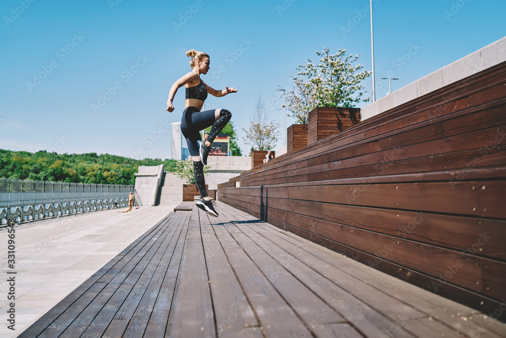 Woman during workout on street stairs