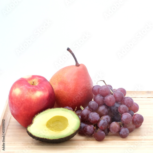 Ripe red grape. Pink isolated on white. With clipping path. Full depth of field.