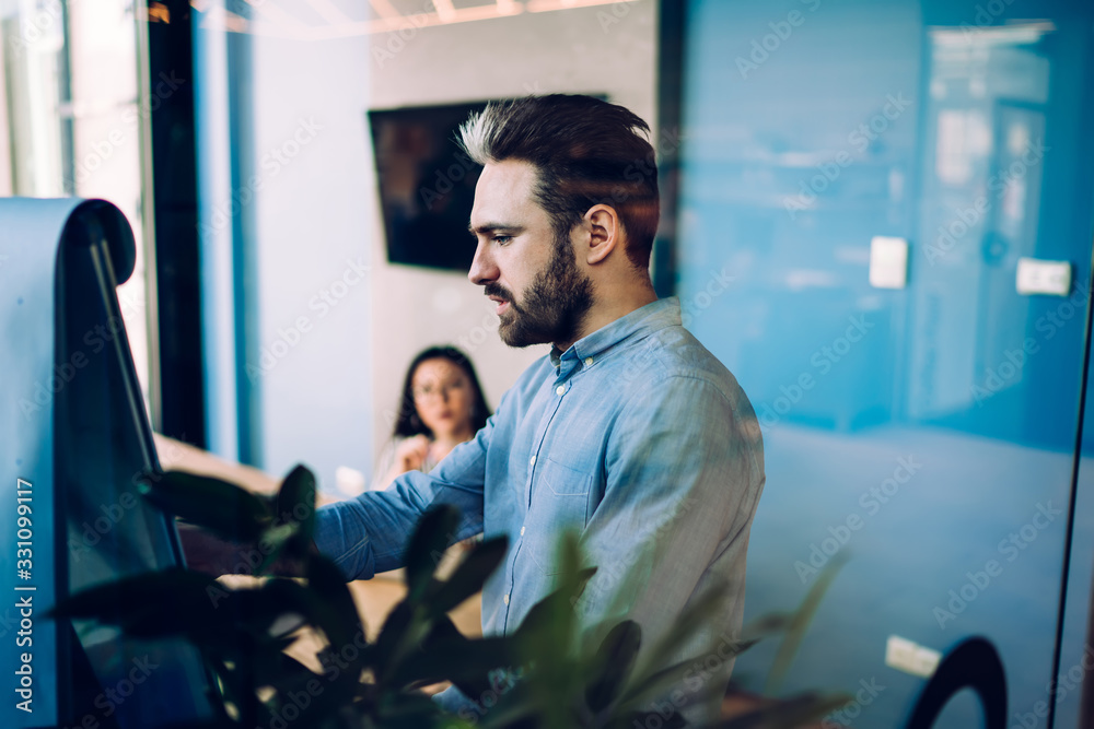Fototapeta premium Bearded man presenting project to boss