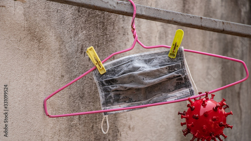 used medical face mask is dry in the sun