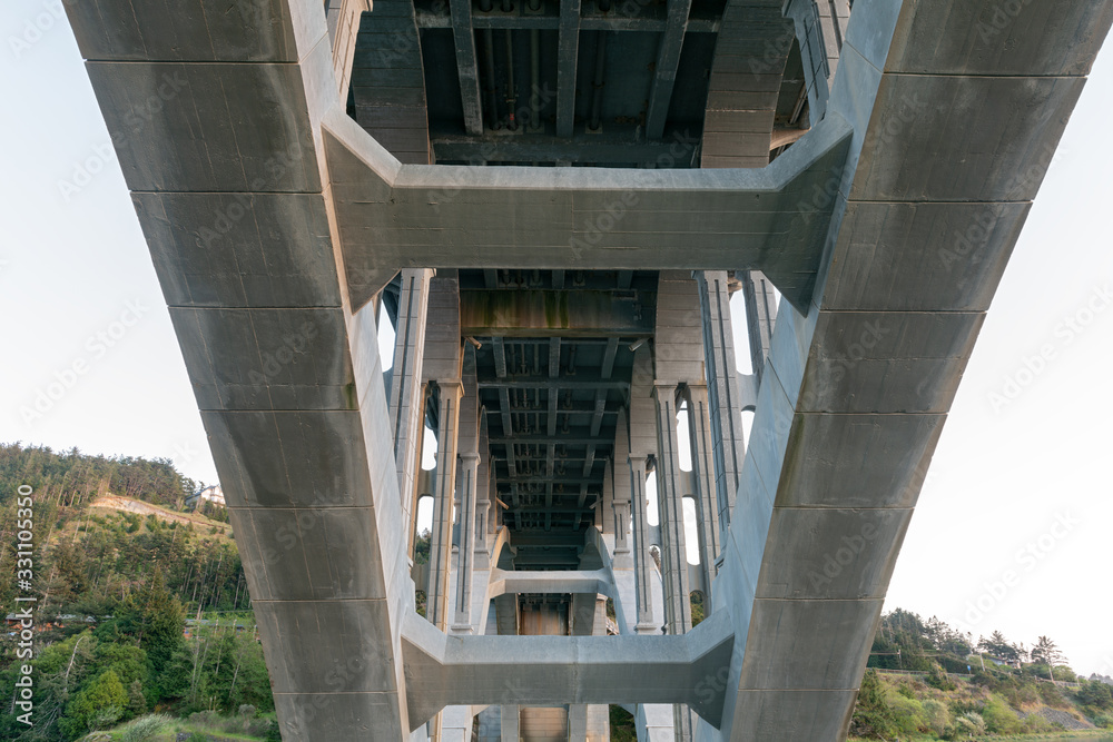 Underneath the Rogue River Bridge at Gold Beach, Oregon, USA Underneath the Rogue River Bridge at Gold Beach, Oregon, USA