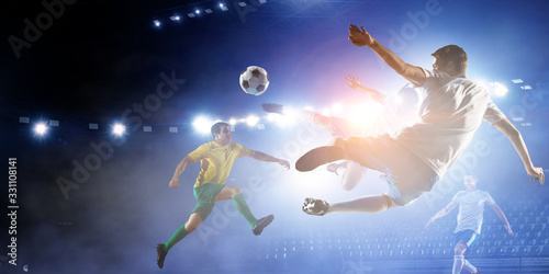 Football players Shooting at Goal © Sergey Nivens