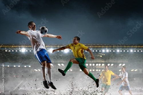 Soccer players on stadium in action. Mixed media