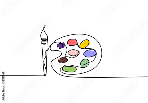 Palette with paints and bru...