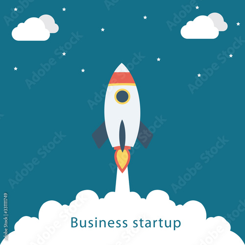 Flat design business startup launch concept with rocket