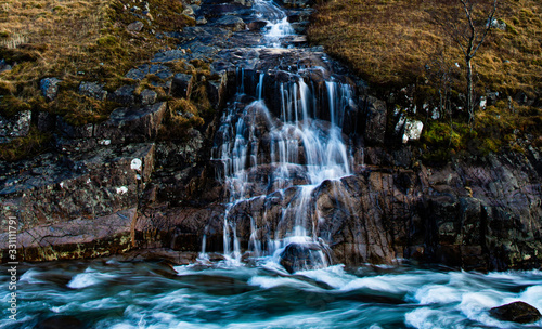 glen etive waterfall, highands, scotland. photo