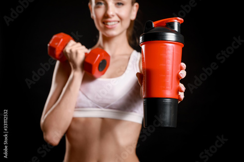 Sporty young woman with pro...