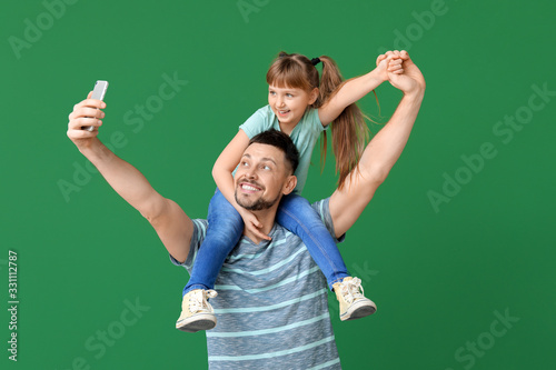 Father and his little daugh...