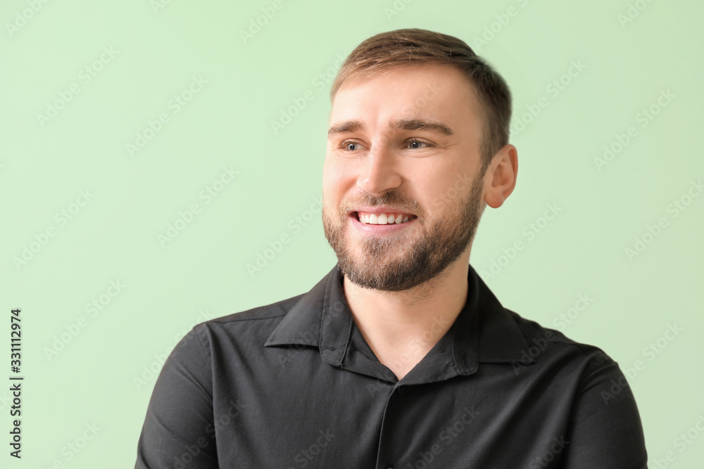 Happy smiling young man with healthy teeth on color background Happy smiling young man with healthy teeth on color background