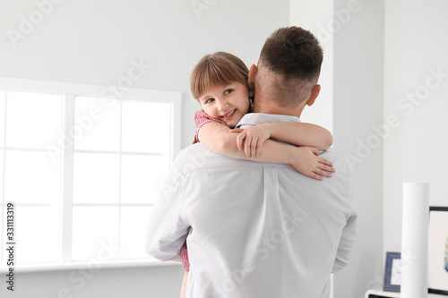 Happy father and his little...