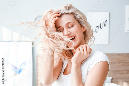 Morning of happy young woma...