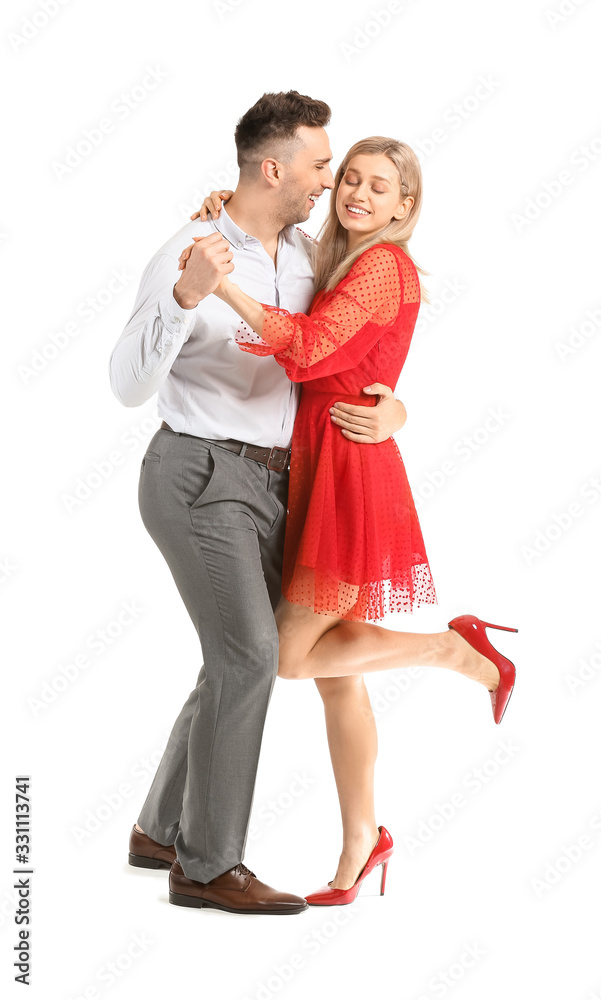 Happy dancing young couple on white background Happy dancing young couple on white background