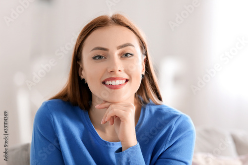 Young woman in warm sweater...