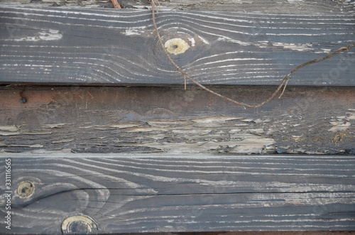 rough wooden boardwalk in sunlight