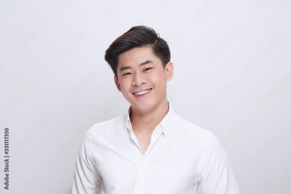 Happy asian business man portrait isolated on white Happy asian business man portrait isolated on white