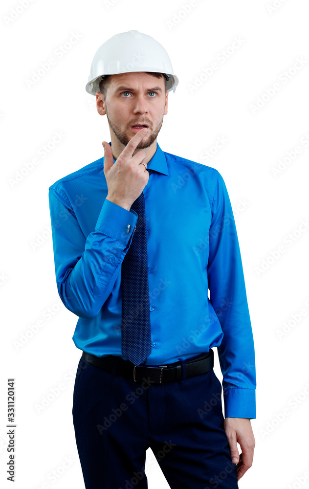 Portrait of young thoughtful man in helmet.