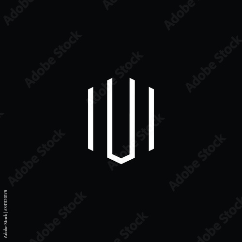 Minimal elegant monogram art logo. Outstanding professional trendy awesome artistic HU UH initial based Alphabet icon logo. Premium Business logo White color on black background