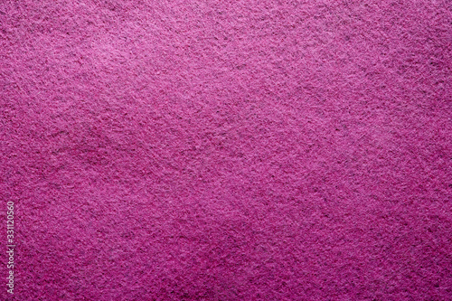 Purple felt soft rough textile material background texture close up