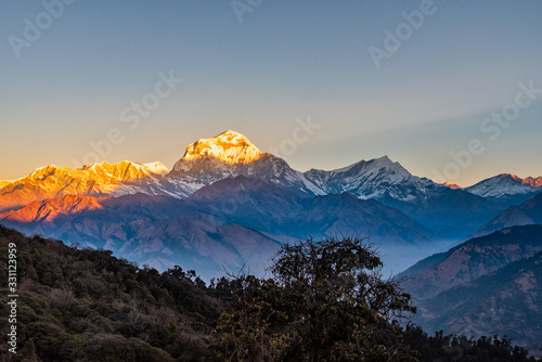 Majestic view of sunset sweeping through Dhaulagiri mountain range from Poon Hill  Ghorepani  Nepal