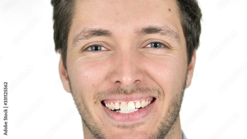 Close Up of Smiling Young Man Face, White Background Close Up of Smiling Young Man Face, White Background