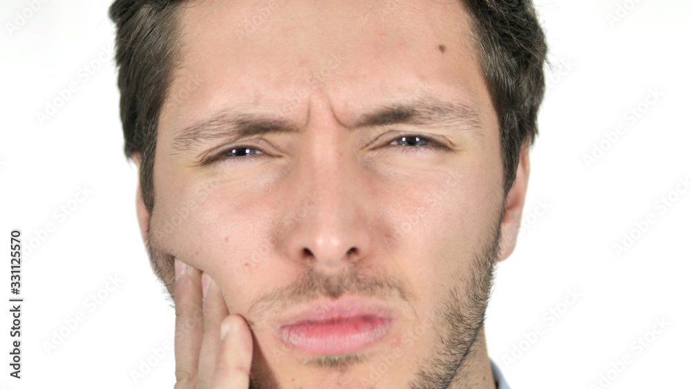 Close up of Young Man with Toothache on white Background Close up of Young Man with Toothache on white Background