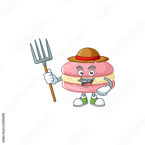 Strawberry macarons in Farmer mascot design with hat and pitchfork