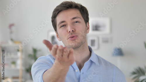 Flying Kiss by Handsome Young Man