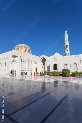 Sultan Qaboos Grand Mosque exterior during sunny day. Sultanate of Oman.