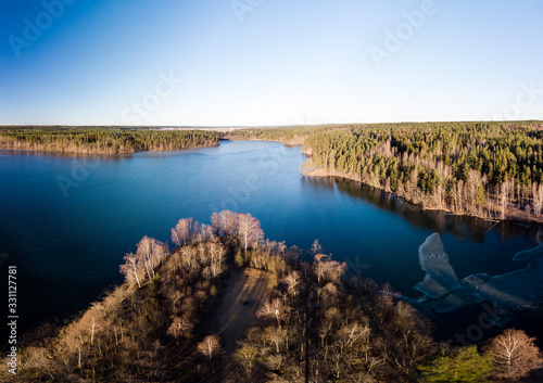 Beautiful panorama of the lake and green forest   aerial landscape. 
