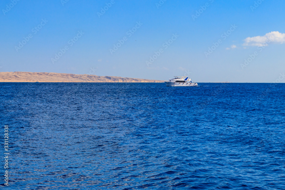 White yacht sailing in Red sea, Egypt