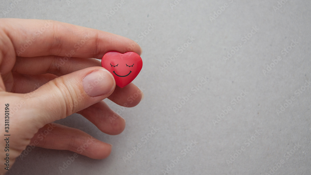 red heart in hand red heart in hand