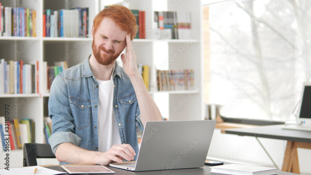 Headache, Stressed Young Casual Redhead Man Working on Project Headache, Stressed Young Casual Redhead Man Working on Project