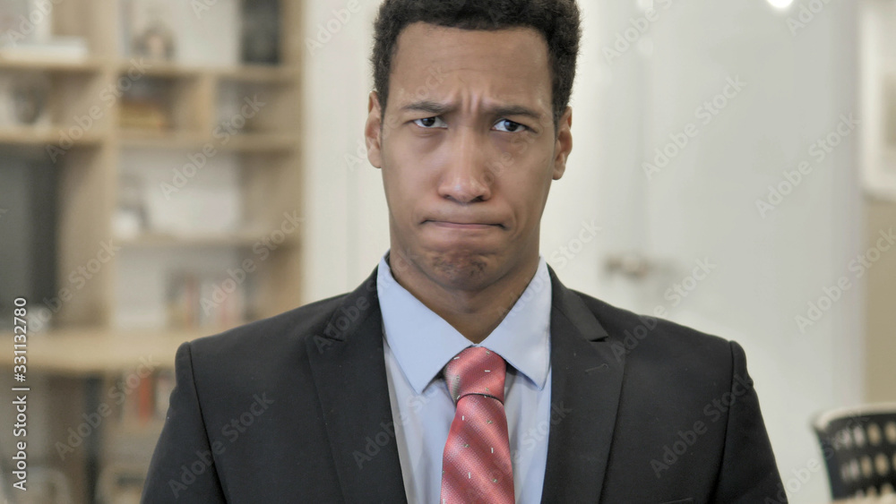 Young African Businessman Shaking Head to Reject Young African Businessman Shaking Head to Reject