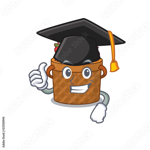 A picture of apple basket with black hat for graduation ceremony