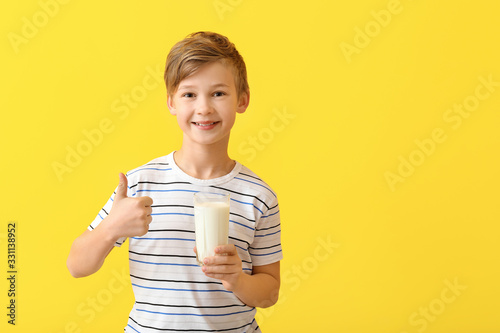 Little boy with milk on col...