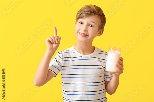 Little boy with milk on col...