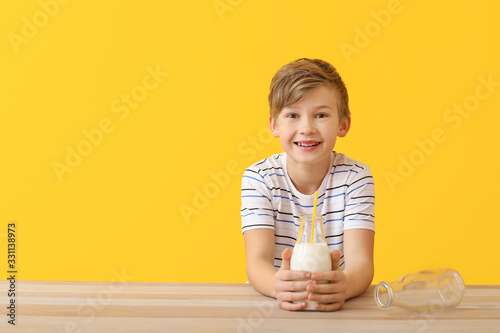 Little boy with milk on col...