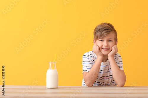 Little boy with milk on col...