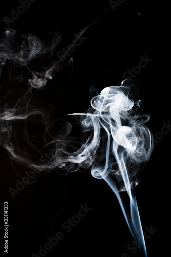 Abstract smoke on black background for designs. 