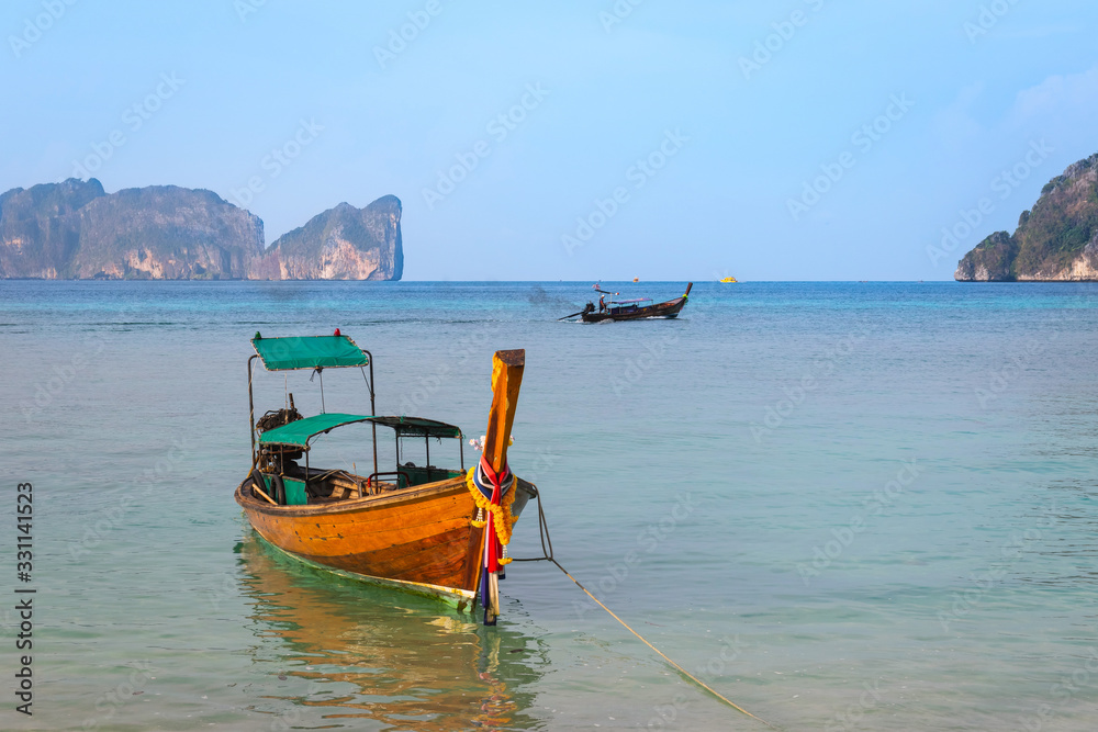Longtail Boat moored at the Long Beach, Phi Phi Islands, Krabi Province, Thailand