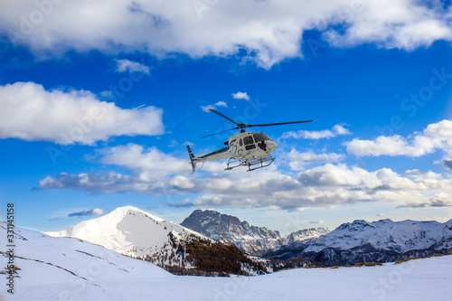 Fototapeta Naklejka Na Ścianę i Meble -  Helicopter in the high mountains