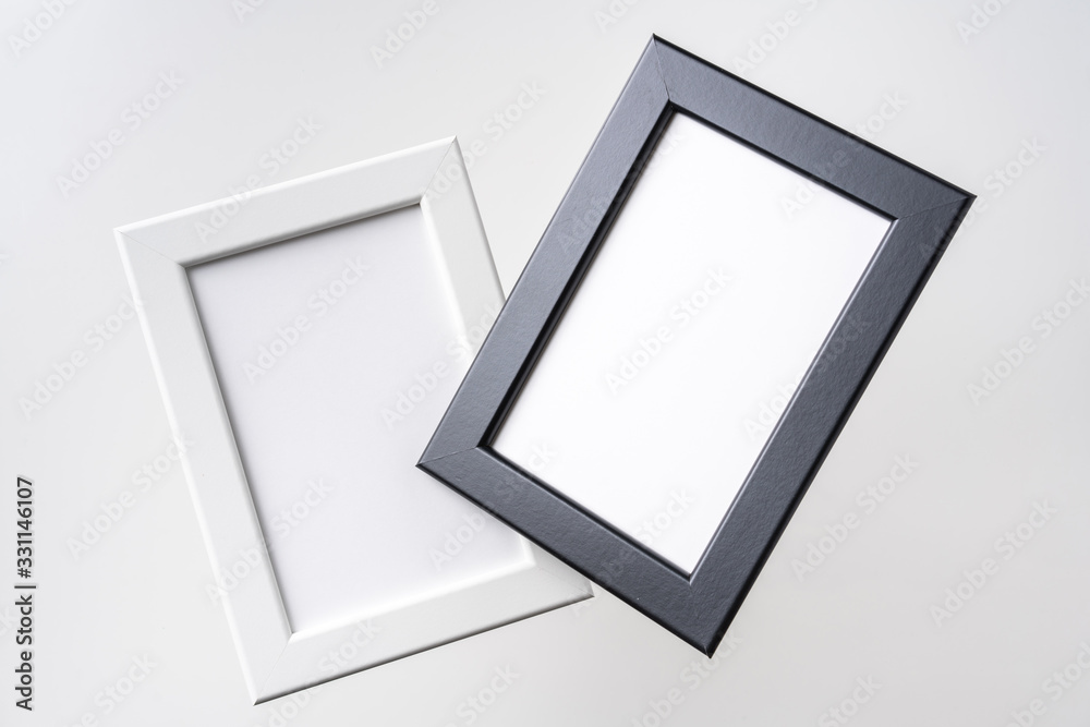 top view of two black and white photo frame on air