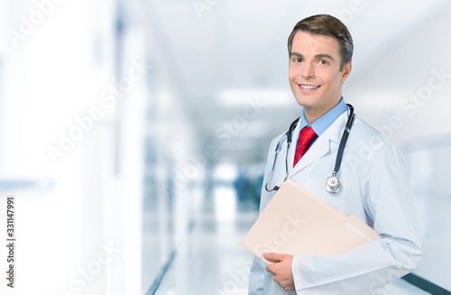 Handsome male young doctor with stethoscope