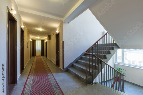 Interior of a hotel doorway with stairs