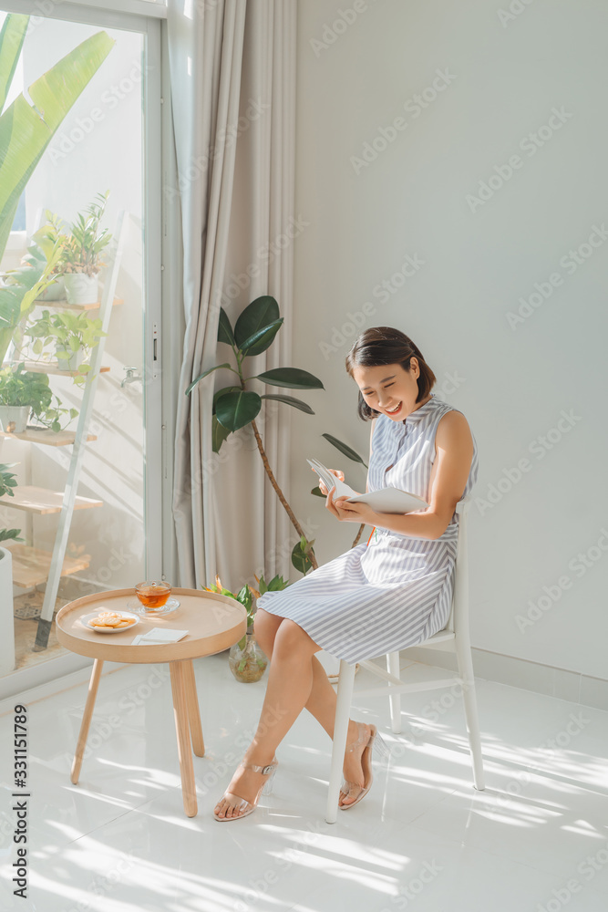 beautiful asian woman reading a book beautiful asian woman reading a book