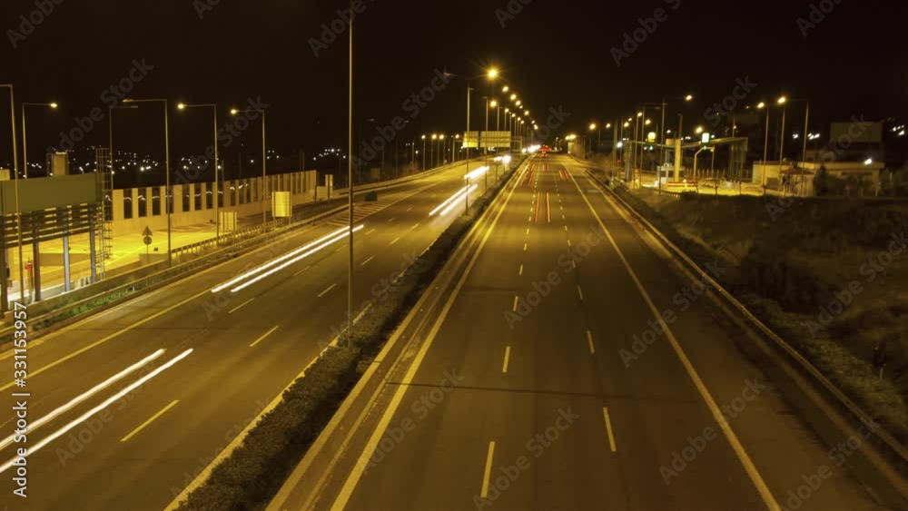 Long exposure time lapse of car lights on highway in Greece at night Long exposure time lapse of car lights on highway in Greece at night