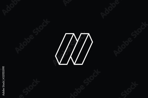 Minimal elegant monogram art logo. Outstanding professional trendy awesome artistic 3D N NN initial based Alphabet icon logo. Premium Business logo White color on black background photo
