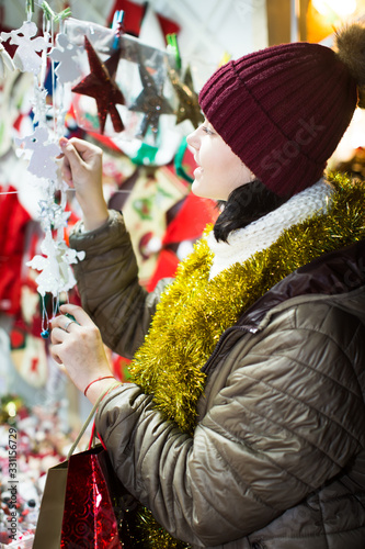 Pretty teen girl with Christmas decoration