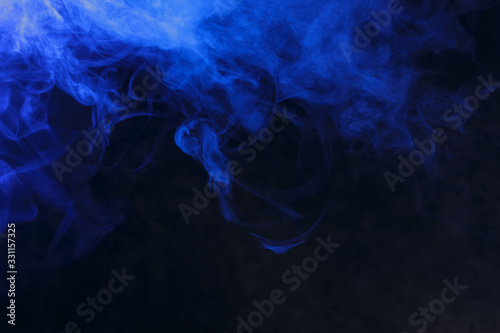 blue smoke on a black background, suitable for advertising a hookah, vape, car smoke, photo shoot or creating a different atmosphere